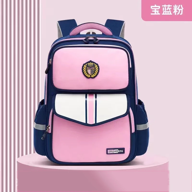 新款英伦风小学生书包1-3-6年级耐磨减压男女童大容量儿童双肩包