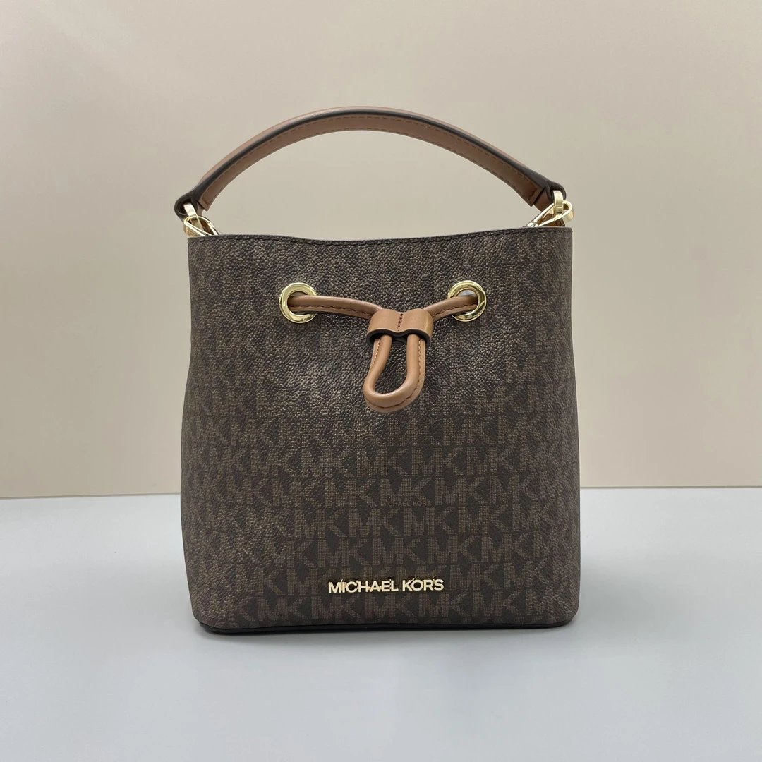 99新 MICHAEL KORS/迈克高仕 棕色老花水桶包18x18x10cmC082711
