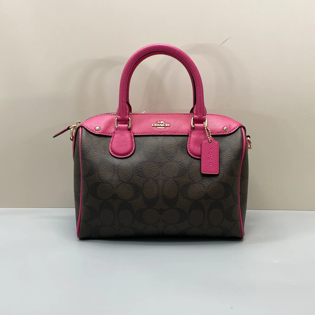 99新 COACH/蔻驰 玫红色老花波士顿包 23*17*11cmD070309