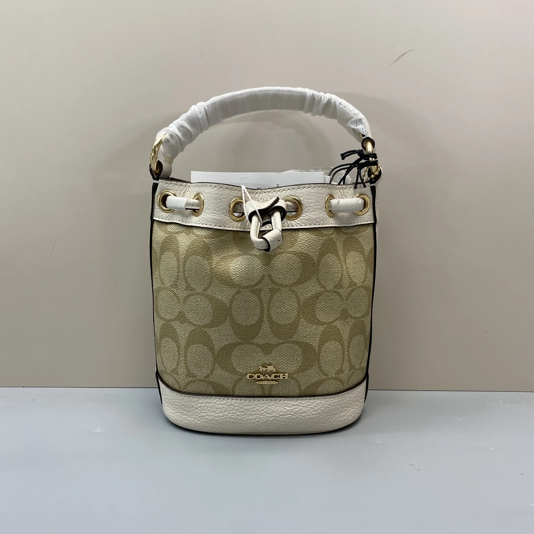 99新 COACH/蔻驰 dempsey白拼老花迷你抽绳水桶包 14*17*9cm