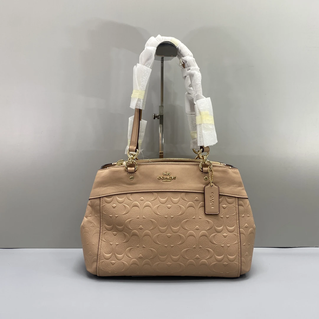 99新 COACH/蔻驰 奶茶色浮雕中号杀手包 32*22*10cmD071601
