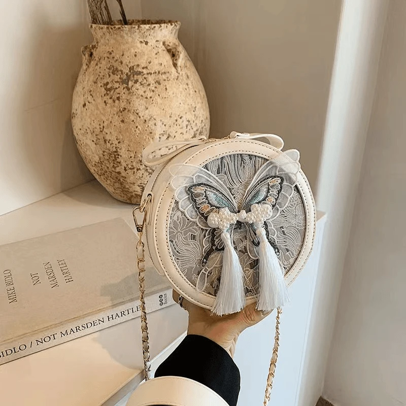 圆饼包女2024新款单肩包蝴蝶刺绣装饰链条肩带斜挎包9325