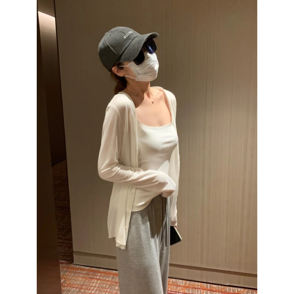 时尚慵懒白色冰丝针织防晒开衫女夏薄款长袖披肩空调罩衫外套上衣