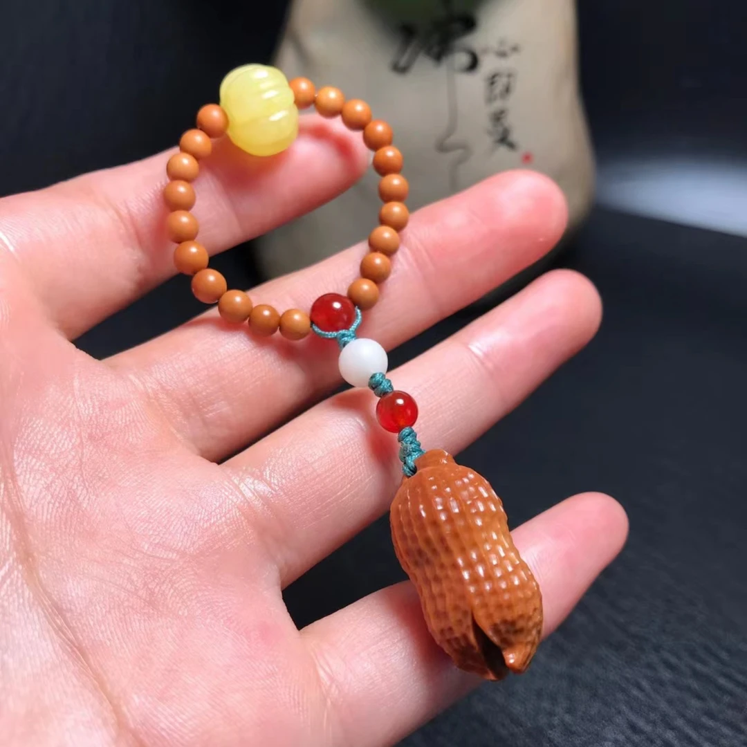 橄榄核雕开口花生手捻挂件吊坠尺寸1.35*2.8cm精美搭配文玩手把件