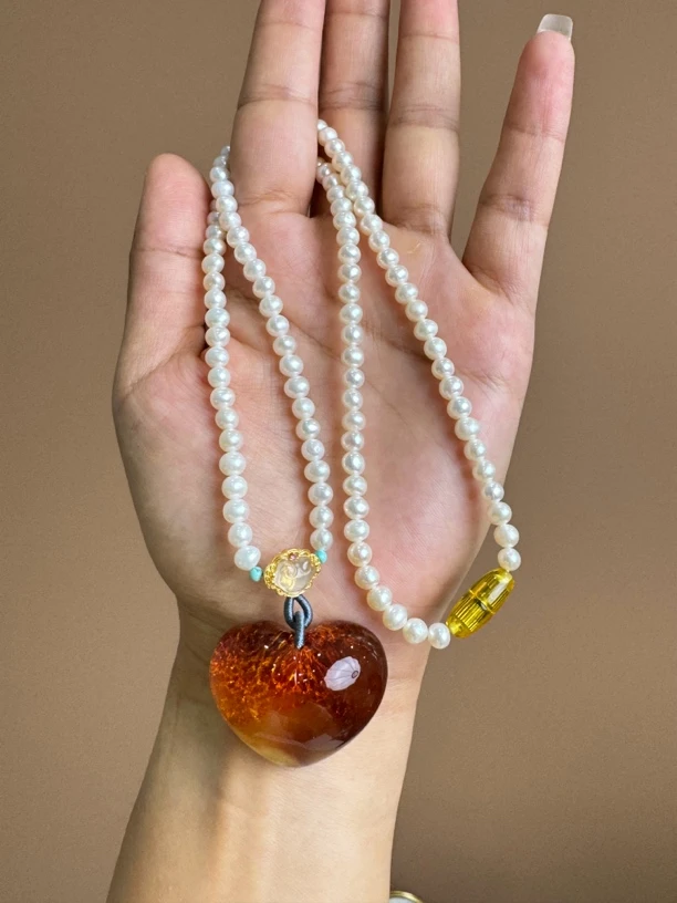 留皮巧雕爱心项链