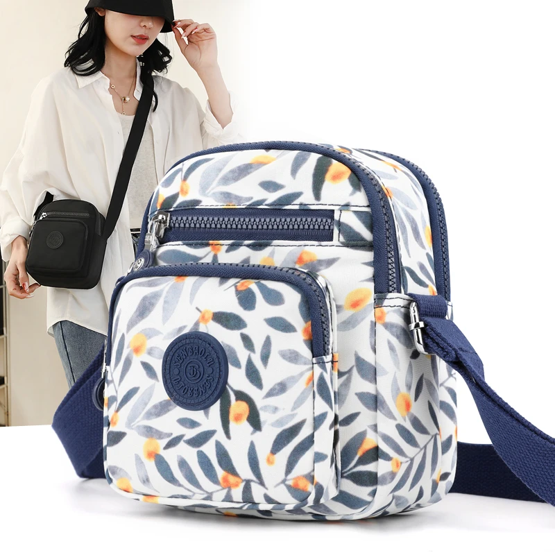 新款斜挎包女休闲小包包单肩女士包时尚百搭手机包防水布包妈妈包