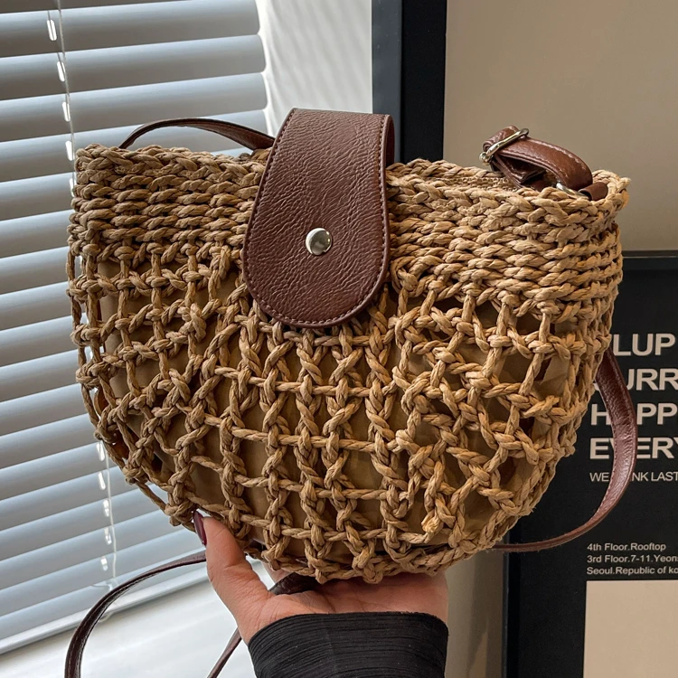 海边编织半圆包流行小包手提包包女2025新款洋气通勤斜挎草编包