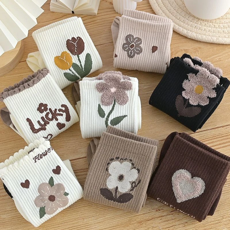 咖色袜子女中筒秋冬季ins潮百搭羽毛纱花朵网红爆款长筒袜女白色