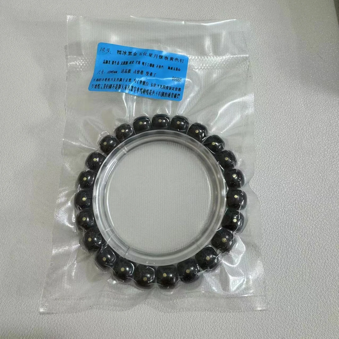 D80尽头糯冰黑金玉化星月镶嵌黄色钉10*9mm手串