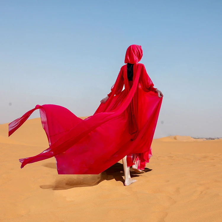 西北西藏青海旅拍连衣裙红色沙滩裙超仙海边度假大拖尾沙漠长裙