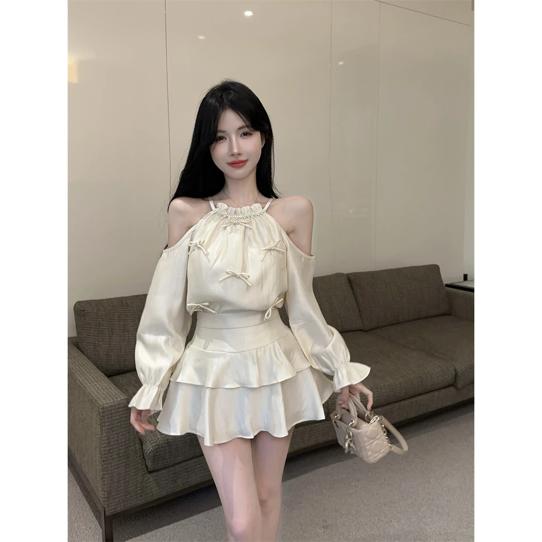 休闲时尚镶钻蝴蝶结喇叭袖挂脖漏肩上衣女装+蛋糕半身裙时尚套装