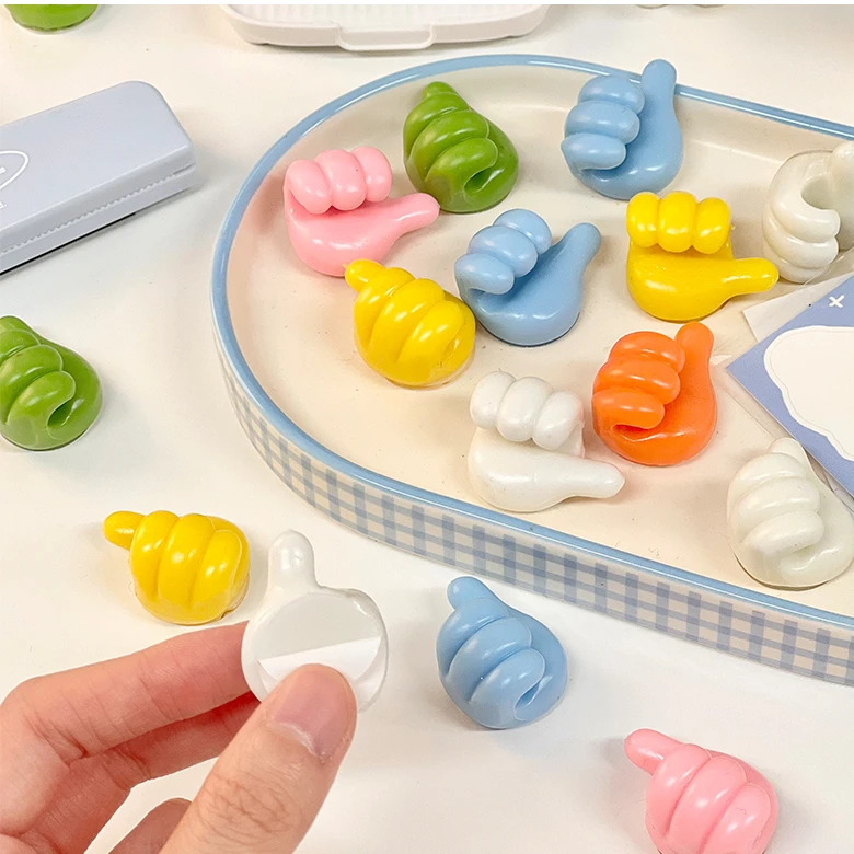 【新疆包邮】大拇指挂钩 粘胶理线器强力无痕免打孔式粘钩卡通自粘