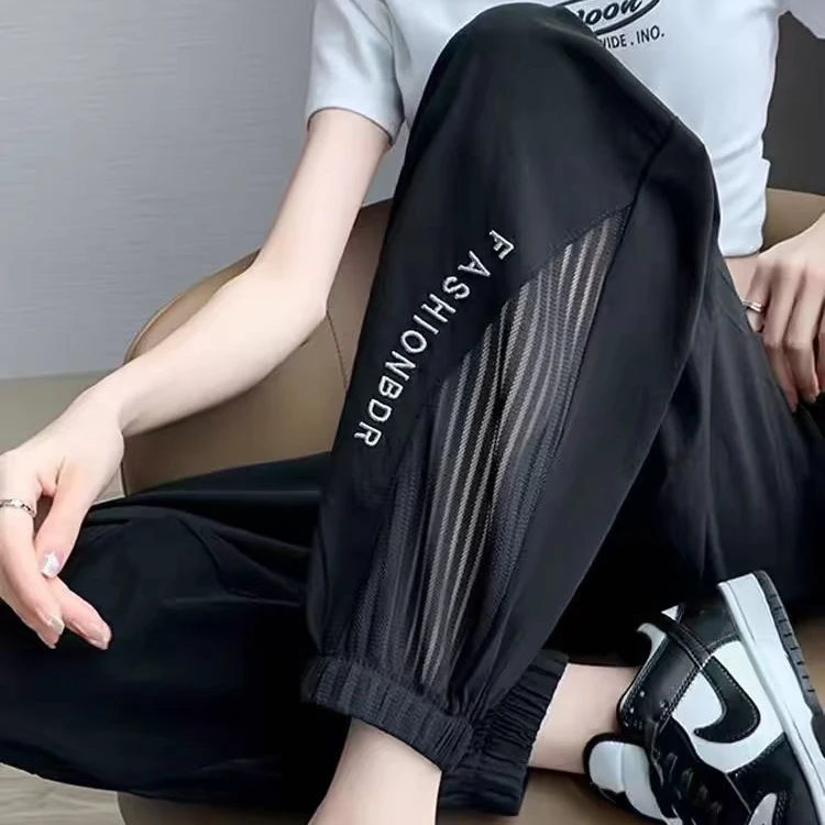 2025夏季薄款冰丝速干运动裤防晒网纱拼接空调裤九分束脚裤1037