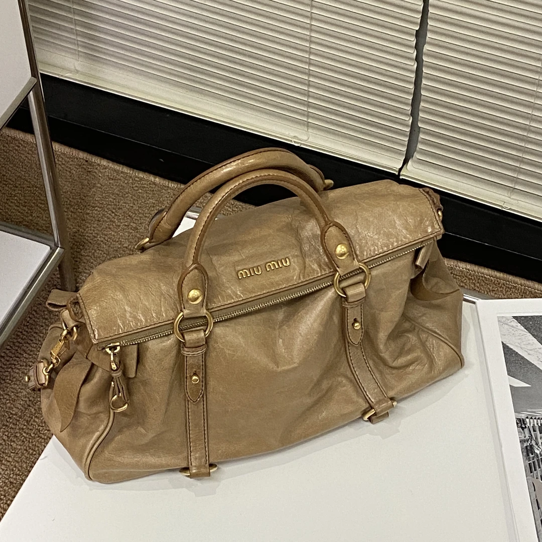 95新 MIU MIU/缪缪 焦糖色金牌蝴蝶结手提包