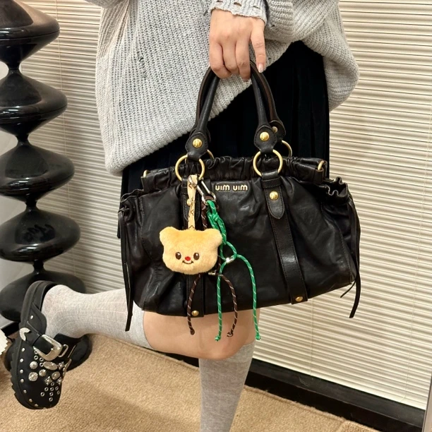 95新 MIU MIU/缪缪 深巧克力棕机车包手提包