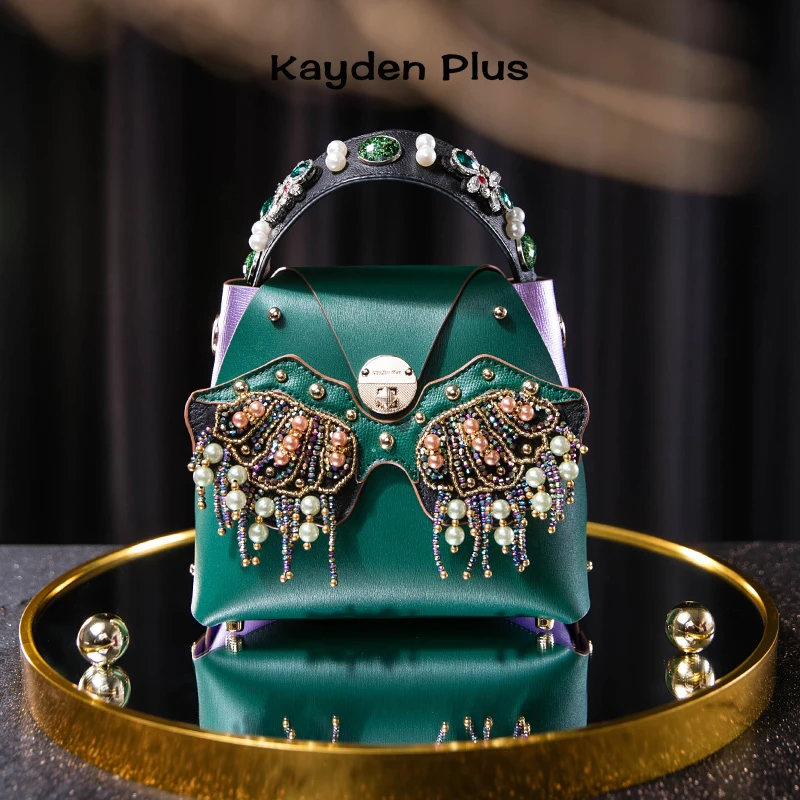 原创时尚珍珠猫头鹰包包女绿色菜篮子桶包毛毛手提真皮双面换脸包