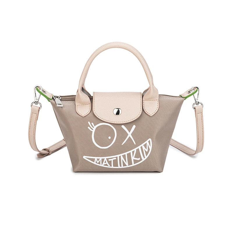 MATIN KIM【2025新款】涂鸦印花饺子包小巧女士通勤单肩斜挎包