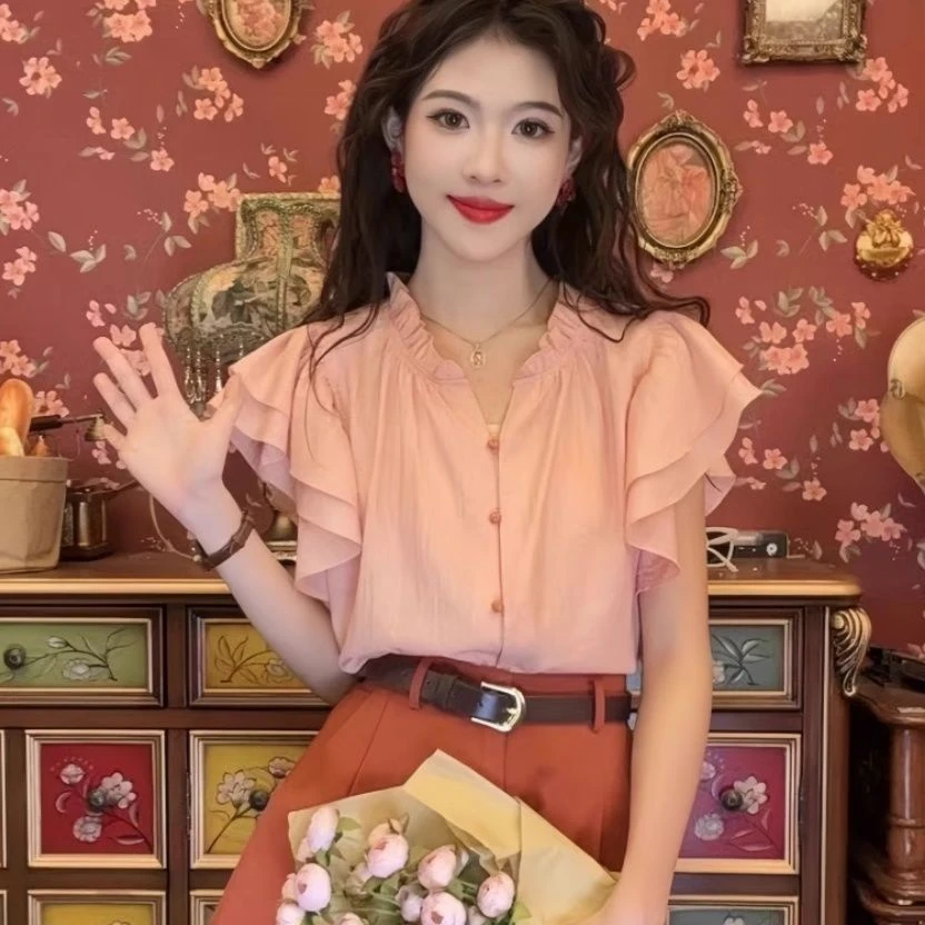 EE粉色三扣荷叶领衬衫 F076