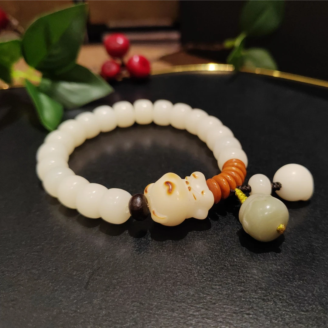 行雪· 天然菩提根算盘珠手串小熊手链 多样性发其一