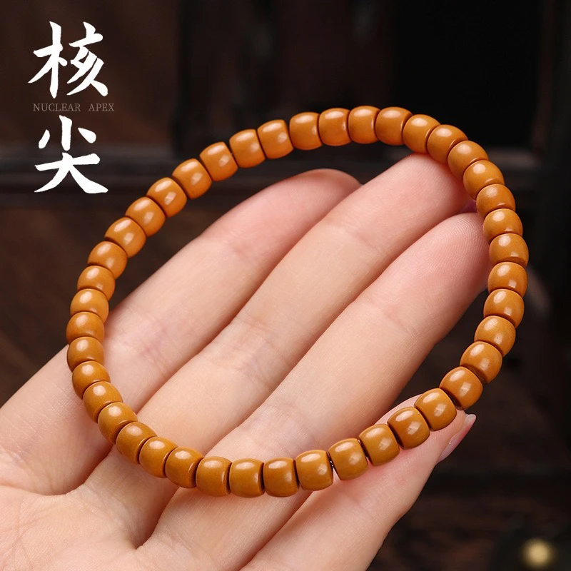 橄榄核清水核核尖直切手串，编好金刚结32粒
