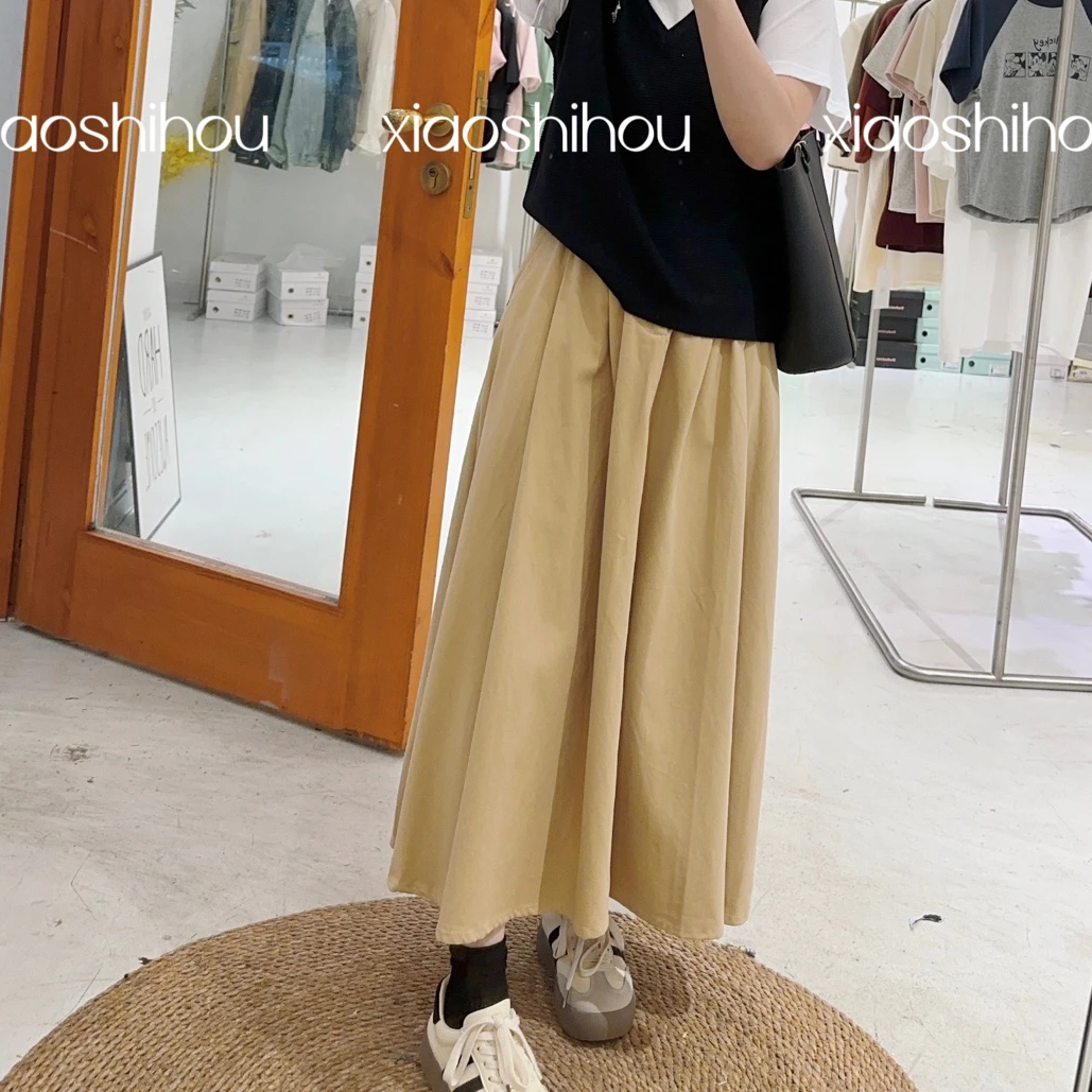 小时候女装店 后面橡皮筋牛仔长裙8222