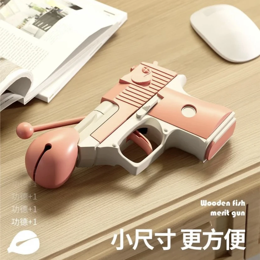 木鱼功德抢萝卜枪二合一指尖陀螺自动回弹枪挂件创意儿童小型玩具