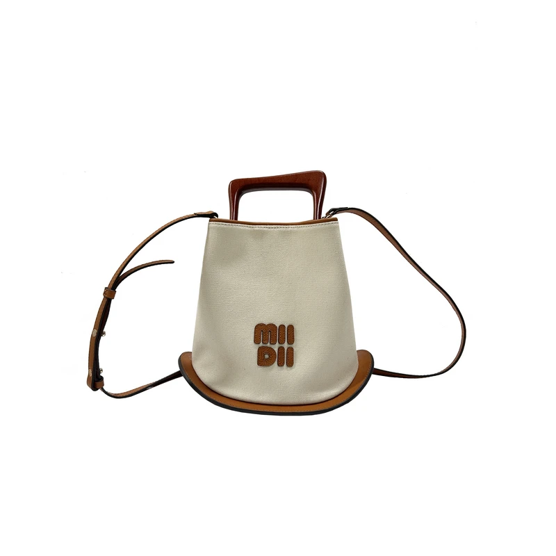 谜底小包包女2024冬季新品复古风帆布拼接小牛皮单肩包244MQ1951