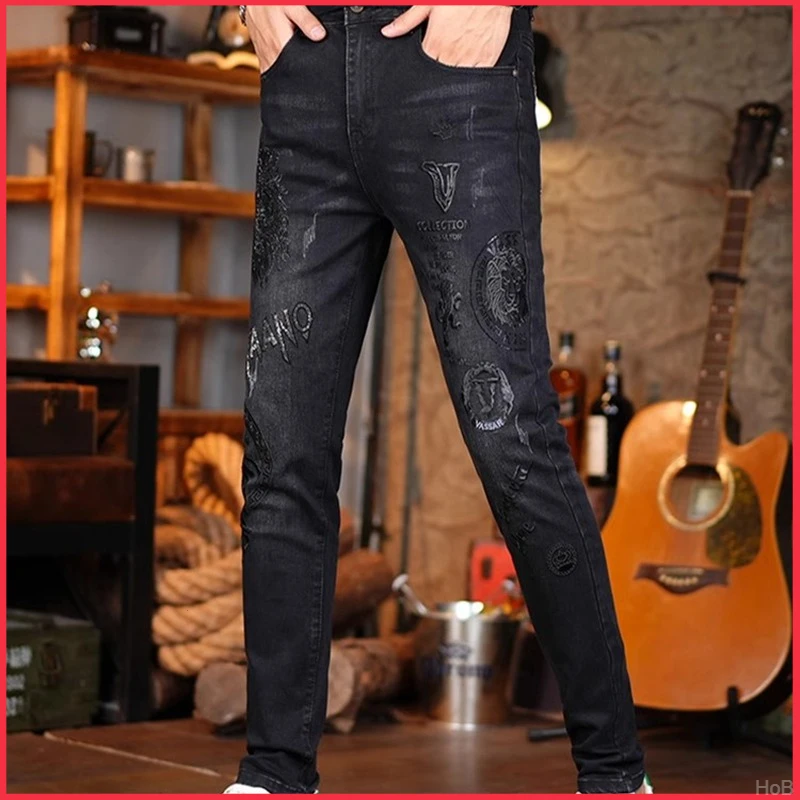牛仔裤男重工潮牌轻奢烫钻休闲修身小脚长裤欧洲站印花秋冬帅气