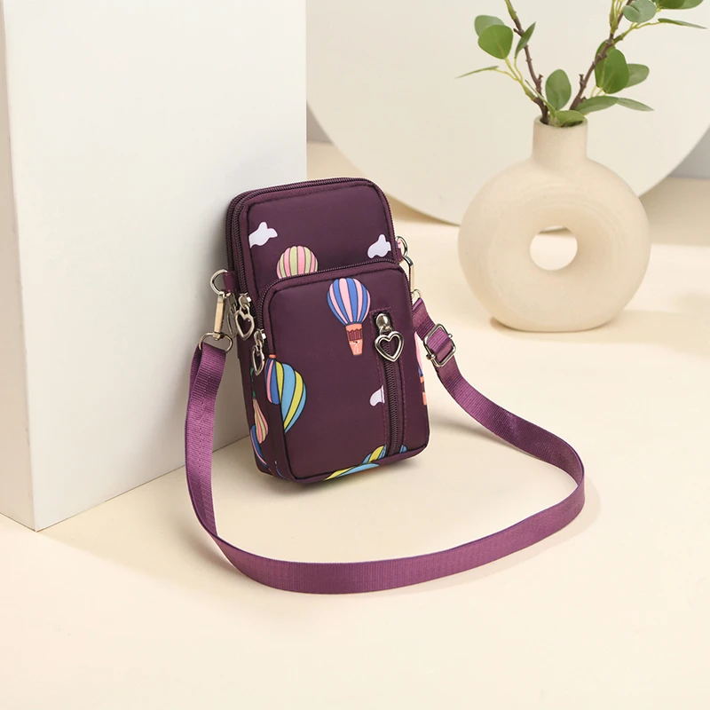 新款手腕零钱布袋便携小包大屏手机包女迷你斜挎包