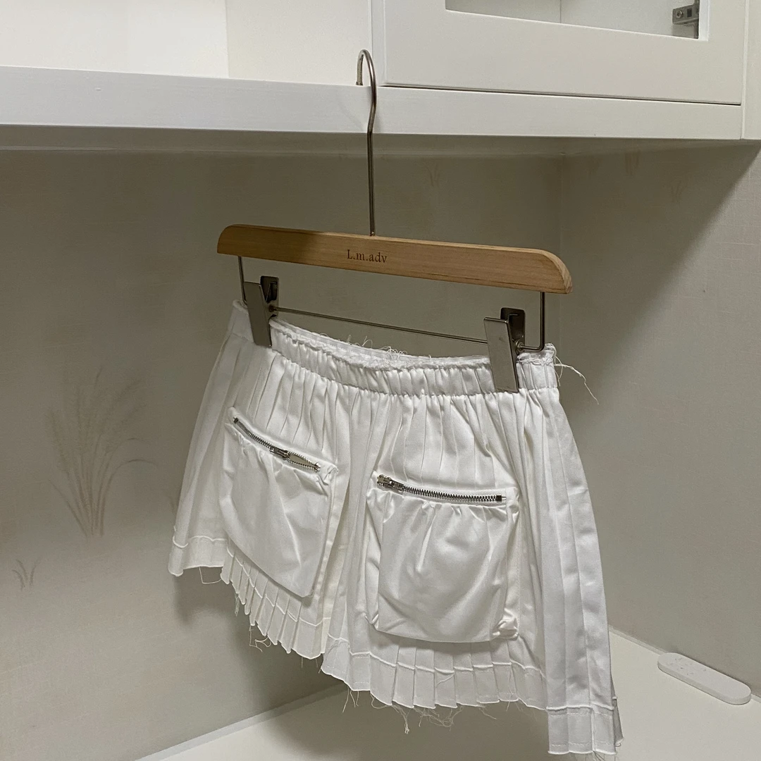 am布丁小众复古辣妹不锁边口袋拉链毛边设计松紧腰百褶半身裙短裙