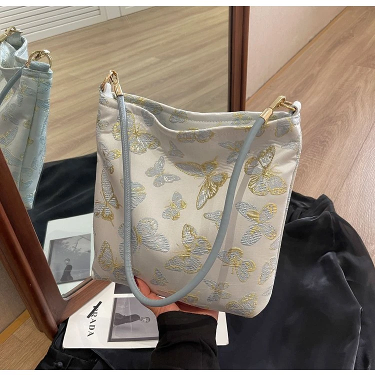 新中式大容量包包女2024新款时尚通勤单肩包国风汉服包水桶包T063