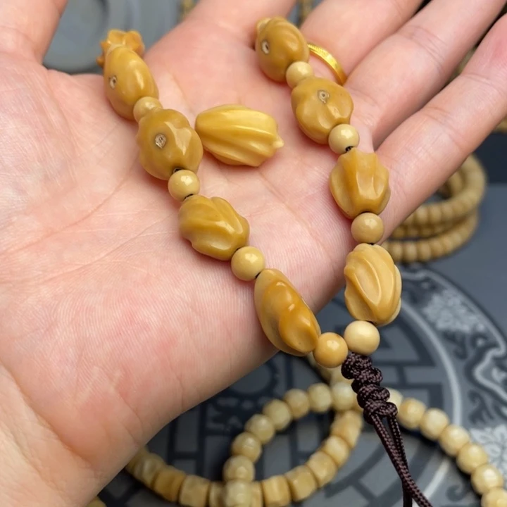 龙眼菩提吊坠向*龙脊菩提原籽手持+三通