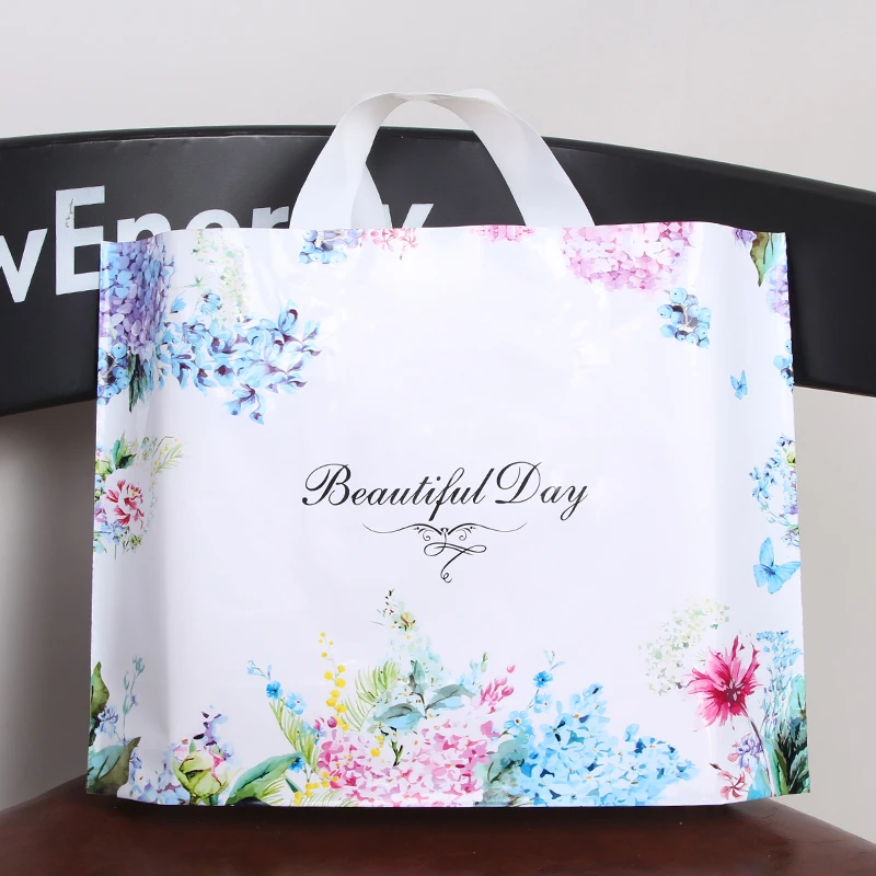 精品手提袋包装袋衣服塑料服装袋礼品购物袋包邮服装店袋子包邮