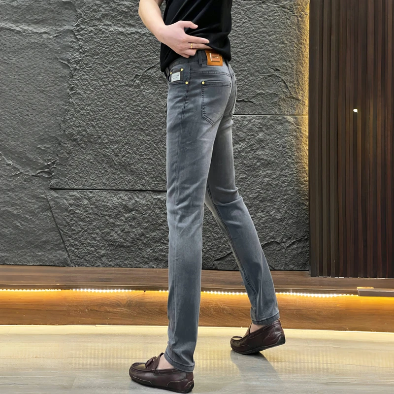 欧货轻奢秋季牛仔裤男潮牌时尚简约小脚裤青年痞帅百搭修身九分裤