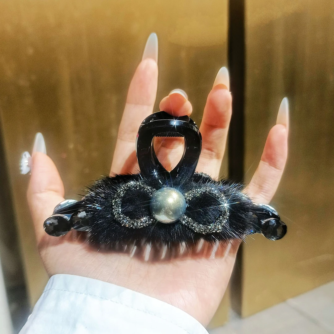 A1132秋冬新款韩版蝴蝶结毛毛黑色抓夹轻奢时尚百搭