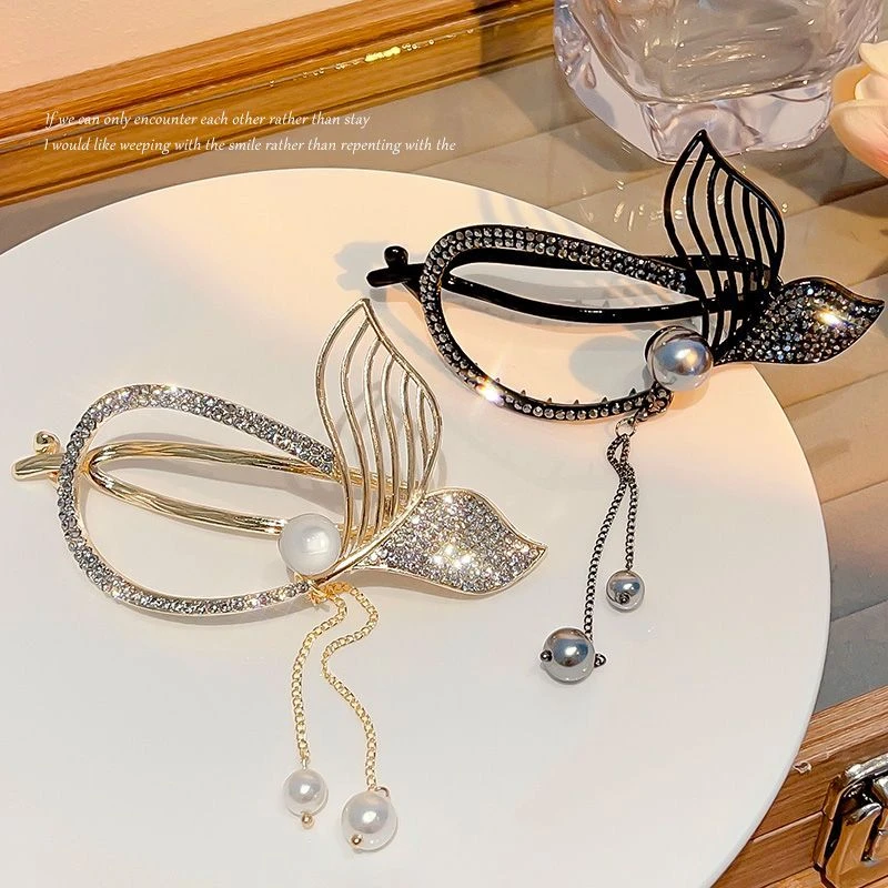 鱼尾扭扭夹2023新款高端流苏发卡后脑勺抓夹高级感盘发发夹一字夹