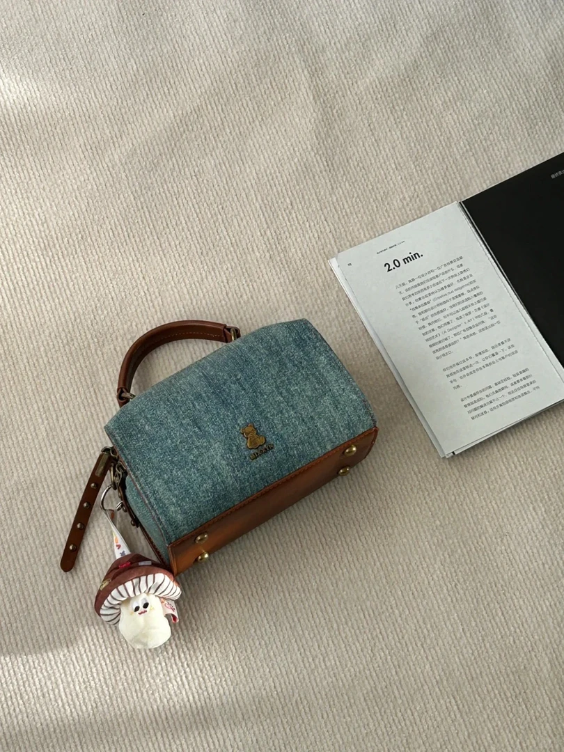 新款个性网红手提牛仔包简约文艺波士顿牛仔拼接斜跨包复古枕头包