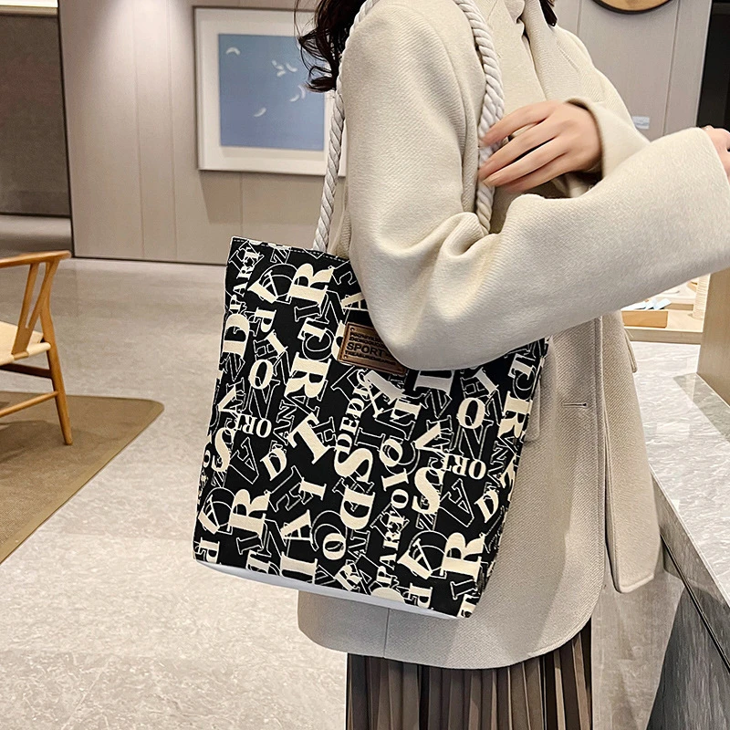 大容量帆布字母大手提新款时尚上班通勤腋下包单肩手提包