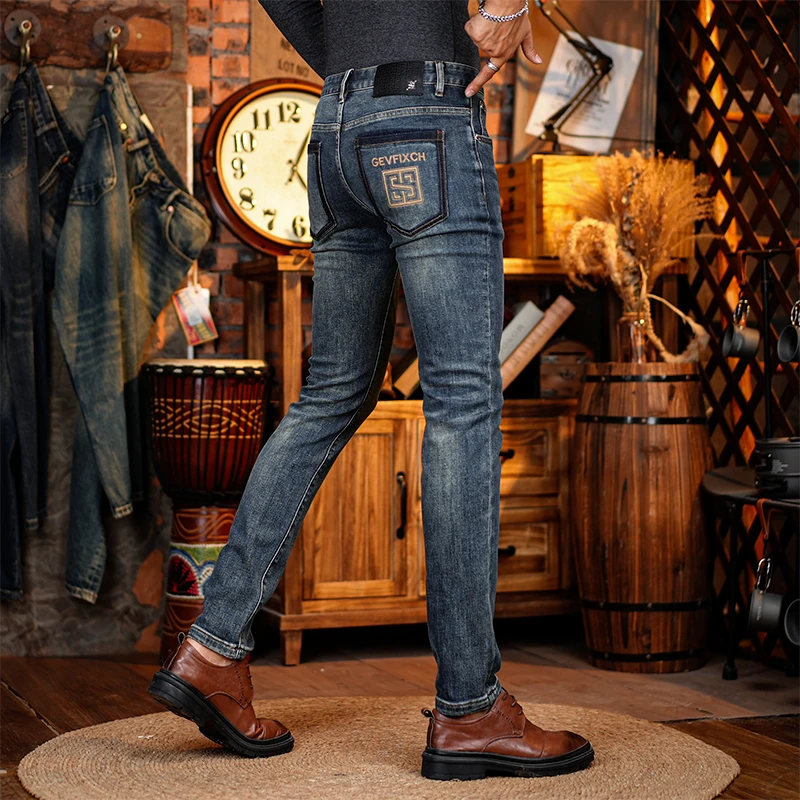 潮流个性男士牛仔裤修身小脚男款弹力时尚刺绣显瘦水洗休闲长裤