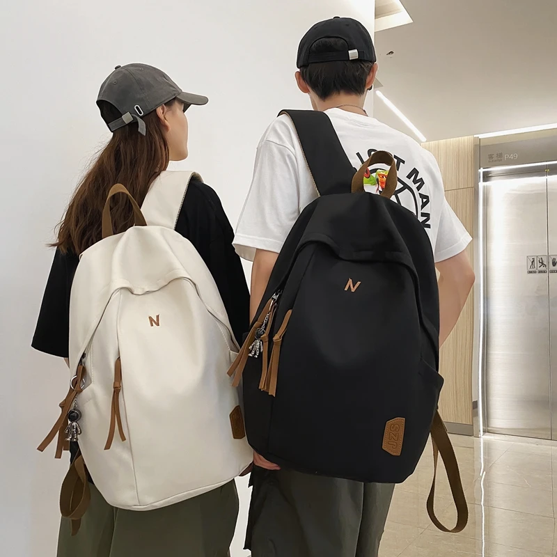 TL9012潮牌双肩包新款书包大学生休闲大容量旅行通勤背包日系TL