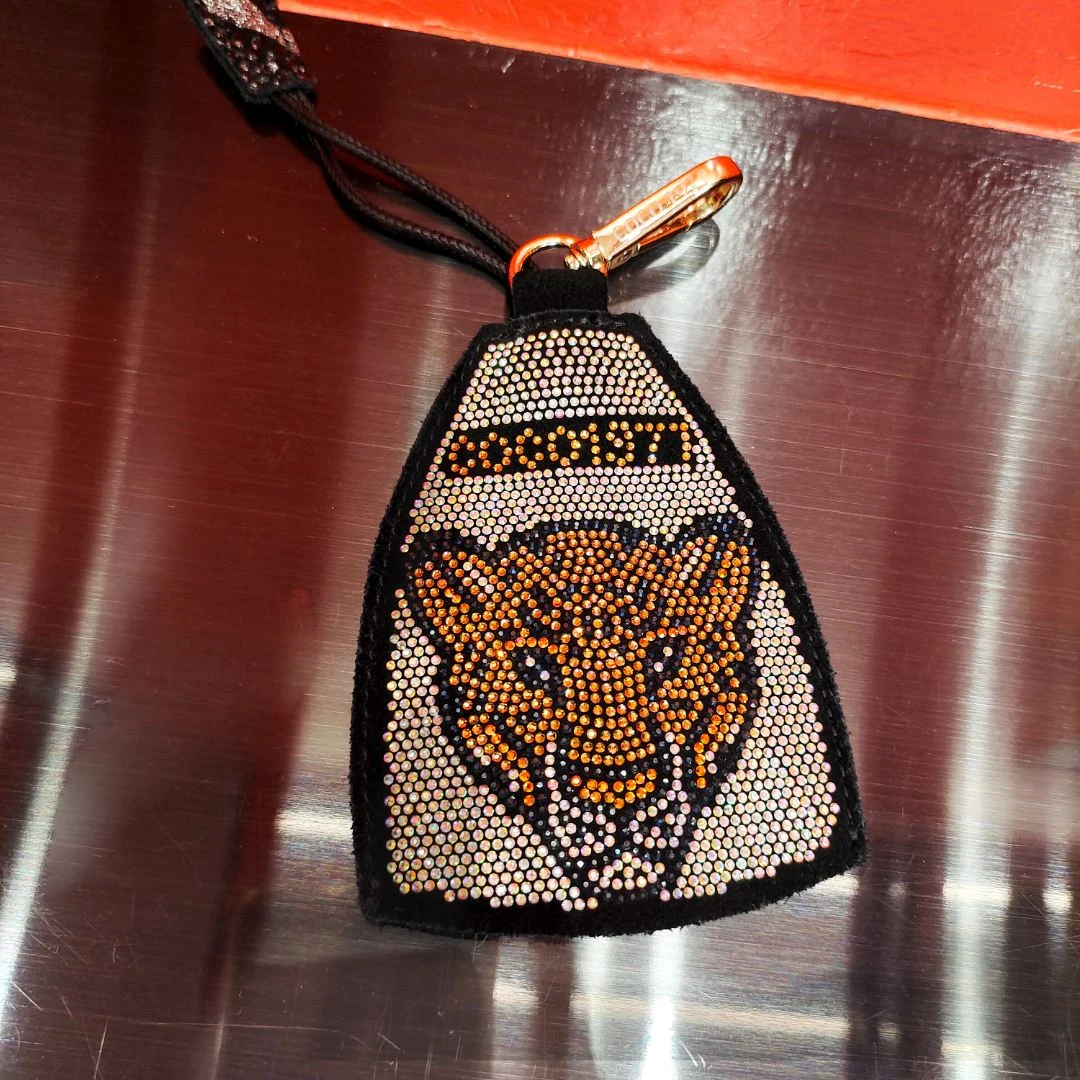 金豹头图案钥匙包