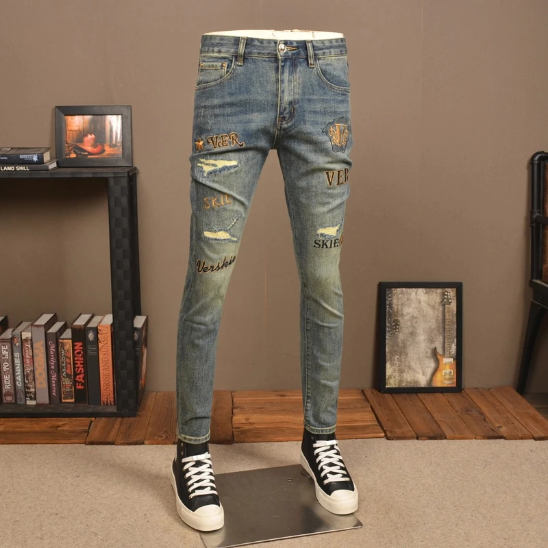 夏春款复古做旧破洞牛仔裤男弹力修身小脚潮牌刺绣水冼休闲裤子男