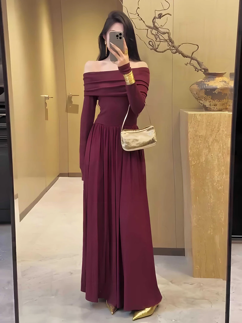 法式一字肩黑色连衣裙女2024新款秋季高级感气质收腰显瘦长袖裙子