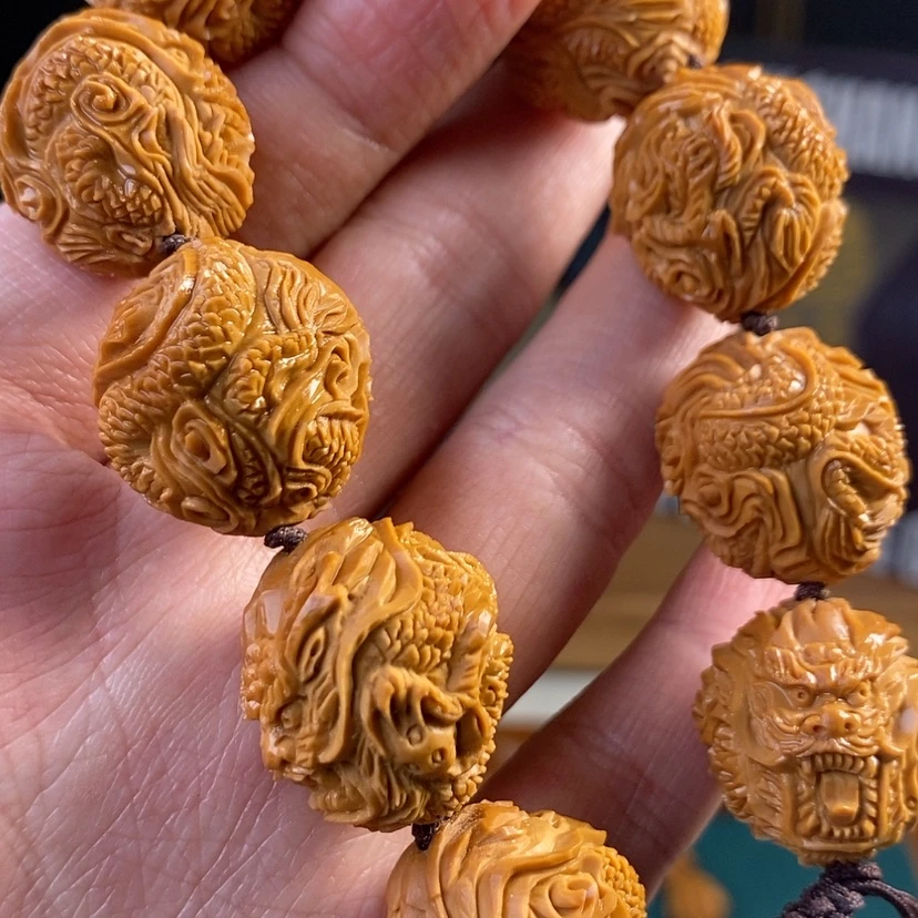 【闪购商品】橄榄核吊坠九龙