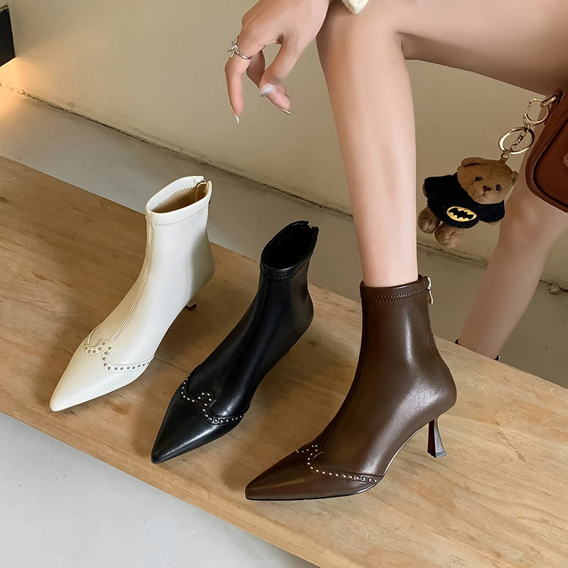跟高6.5cm/34-39/新款法式时尚尖头高跟铆钉瘦瘦靴纯色细跟短靴女