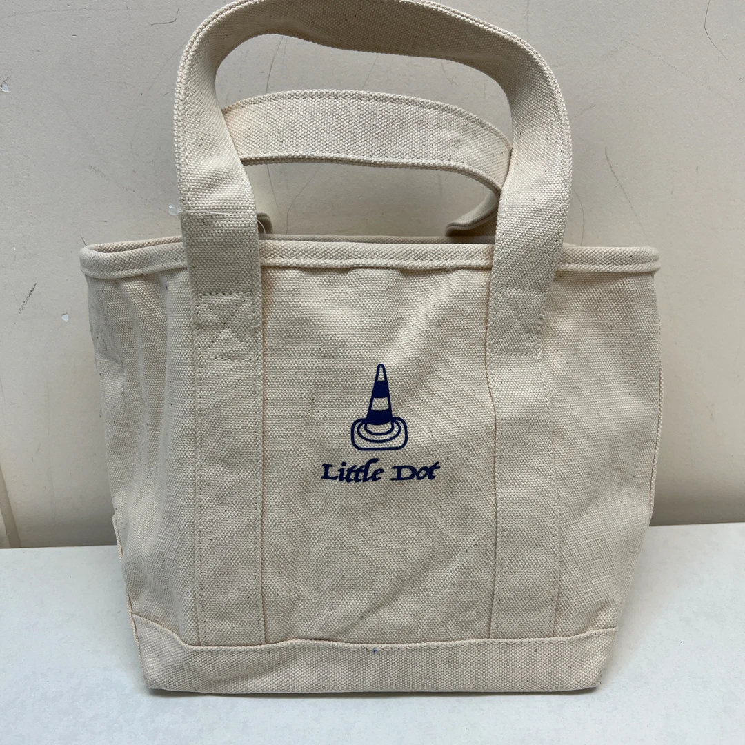 54845  米色小号加厚帆布包，包带可调节，尺寸：22*34cm