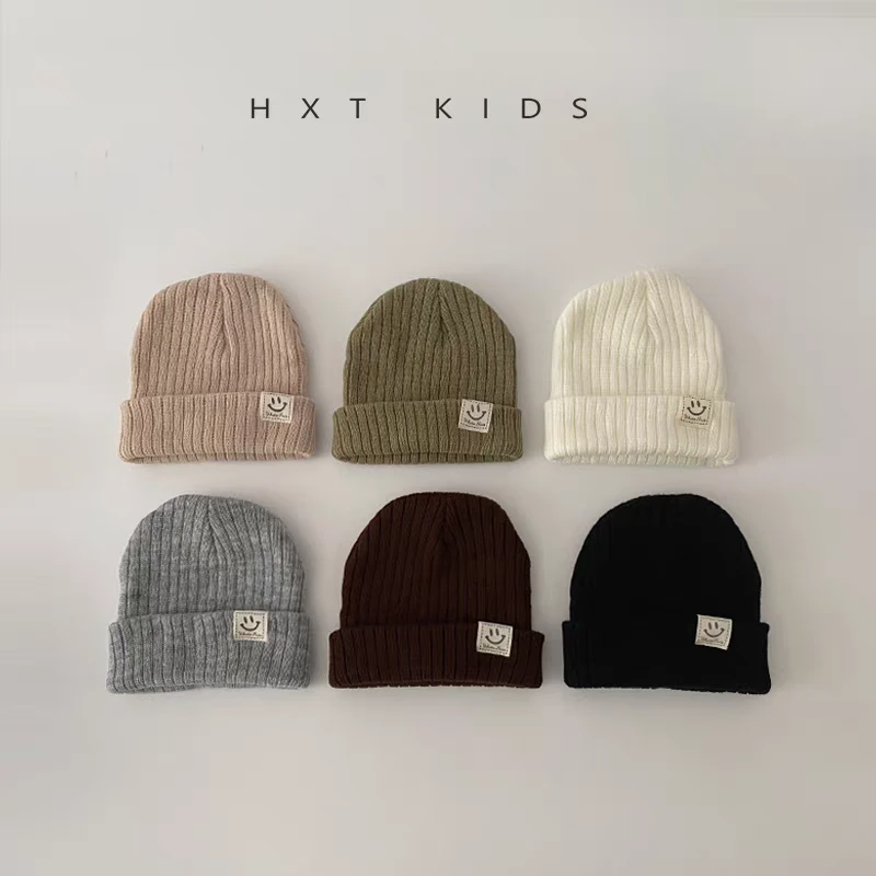 婴儿毛线帽秋冬季笑脸小标纯色针织帽小月龄婴幼儿宝宝保暖帽子潮