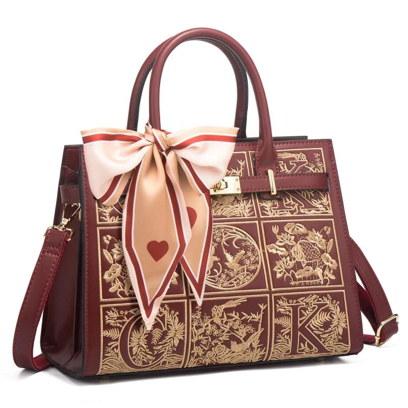 香港软皮刺绣手提包2025新款新娘结婚包大容量绣花送妈妈生日礼物