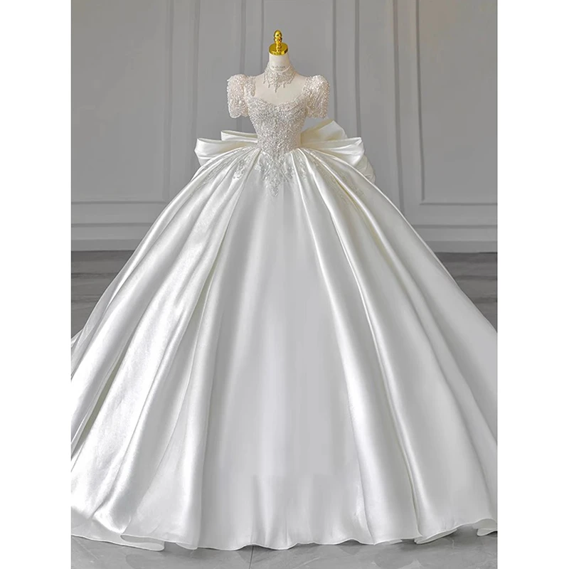 缎面婚纱礼服试婚纱主婚纱大码轻新娘复古白色拖尾一字肩结婚重工