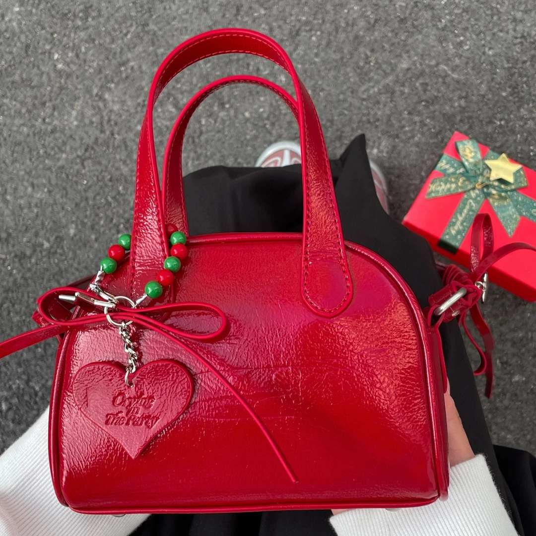 Crying center/哭喊中心圣诞红mini波士顿蝴蝶结油蜡亮皮经典斜挎